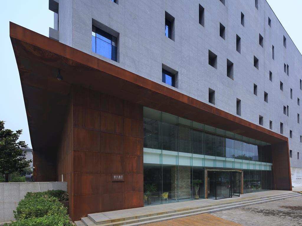 Отель Ease House Luoyang Лоян Экстерьер фото